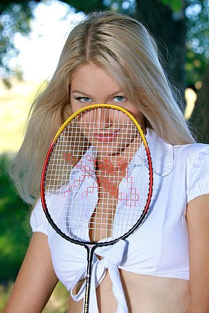 Short black skirt tennis-loving blonde slowly undressing outdoors
